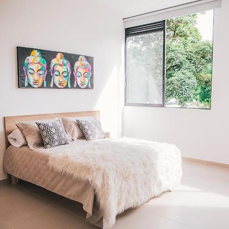Apartasuites 21 A Pereira Bagian luar foto