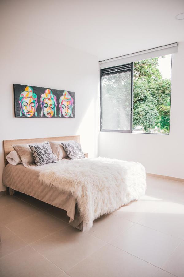 Apartasuites 21 A Pereira Bagian luar foto
