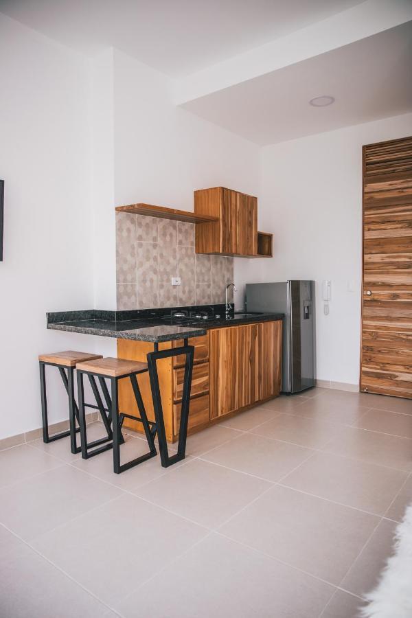 Apartasuites 21 A Pereira Bagian luar foto